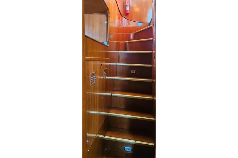 Slide: The Image of Wooden staircase inside 1988 Cheoy Lee 51 Long Range Cockpit Motor Yacht. - 29