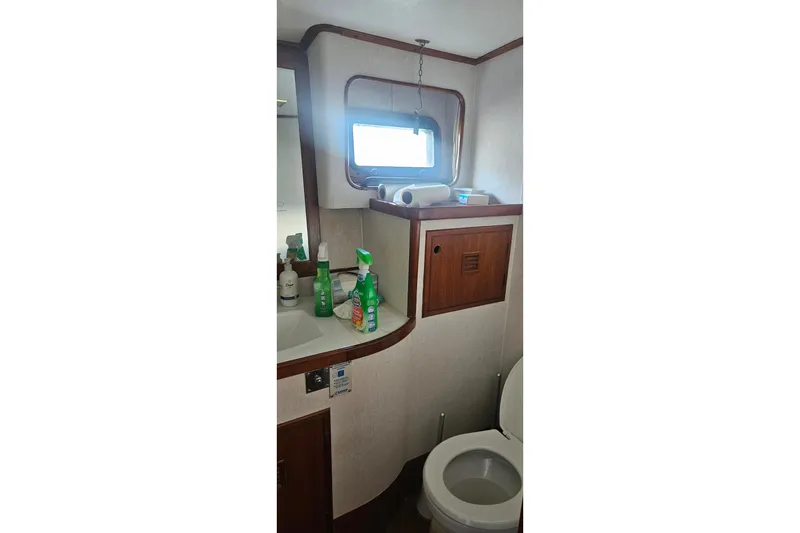 Slide: The Image of Bathroom interior of 1988 Cheoy Lee 51 Long Range Cockpit Motor Yacht. - 35