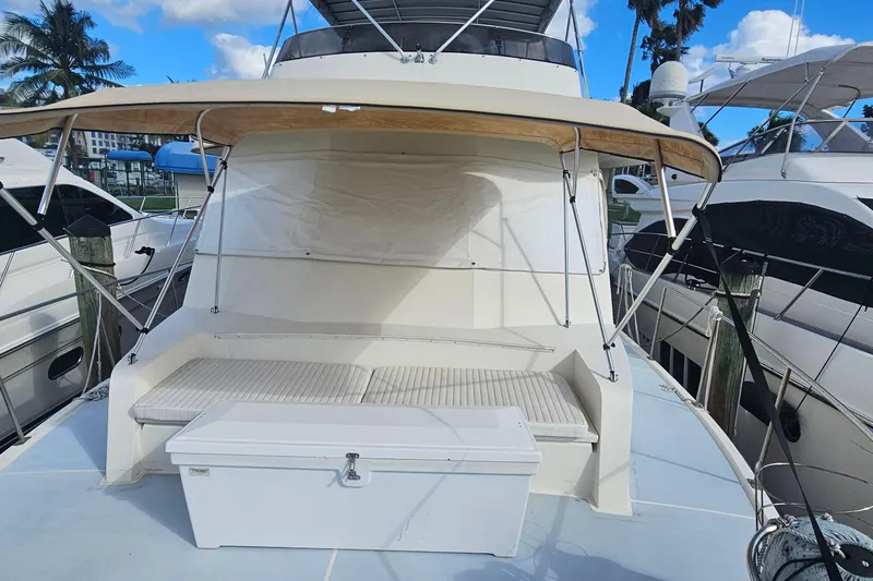 Slide: The Image of 1988 Cheoy Lee 51 Long Range Cockpit Motor Yacht with seating and storage on deck. - 36