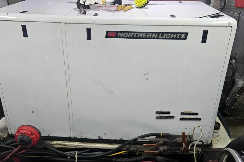 Slide: The Image of Northern Lights generator in 1988 Cheoy Lee 51 Long Range Cockpit Motor Yacht engine room. - 47