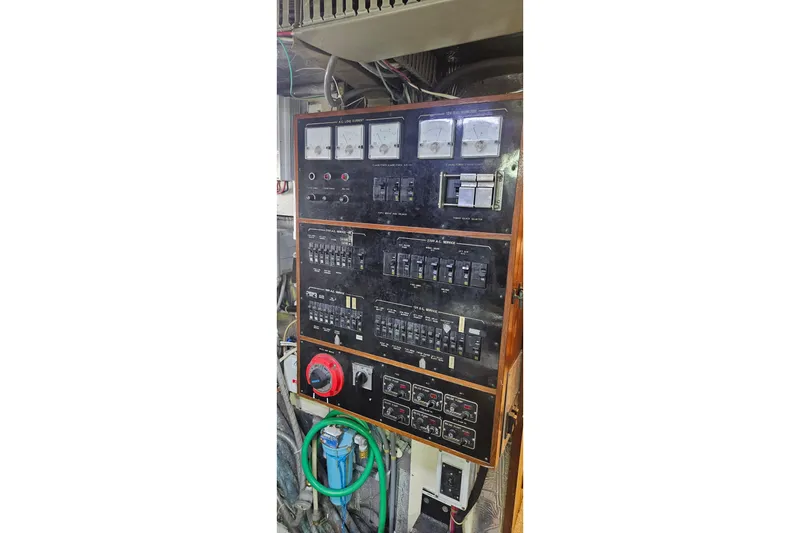 Slide: The Image of Electrical control panel on 1988 Cheoy Lee 51 Long Range Cockpit Motor Yacht. - 49
