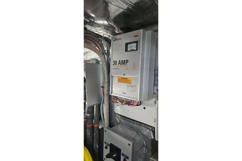 Slide: The Image of 30 AMP battery charger in 1988 Cheoy Lee 51 Long Range Cockpit Motor Yacht. - 51
