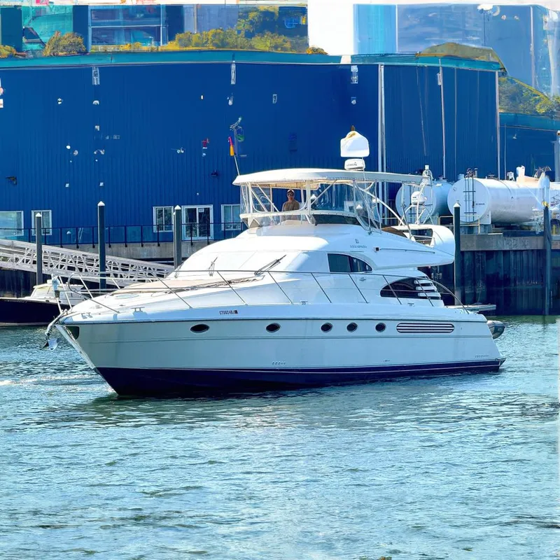 The Image of 2000 Fairline Squadron 55 yacht docked in harbor. - 0
