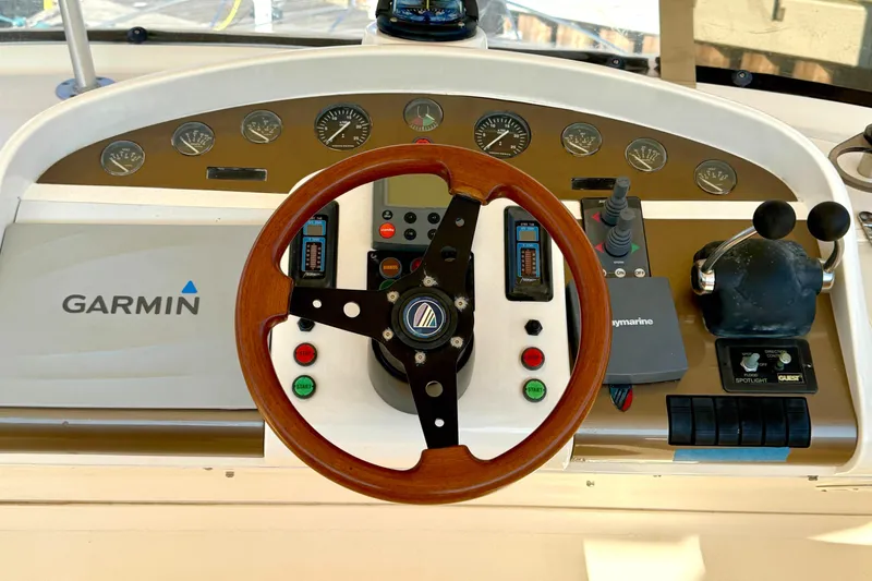 Slide: The Image of Control panel of 2000 Fairline Squadron 55 yacht with Garmin navigation system. - 11