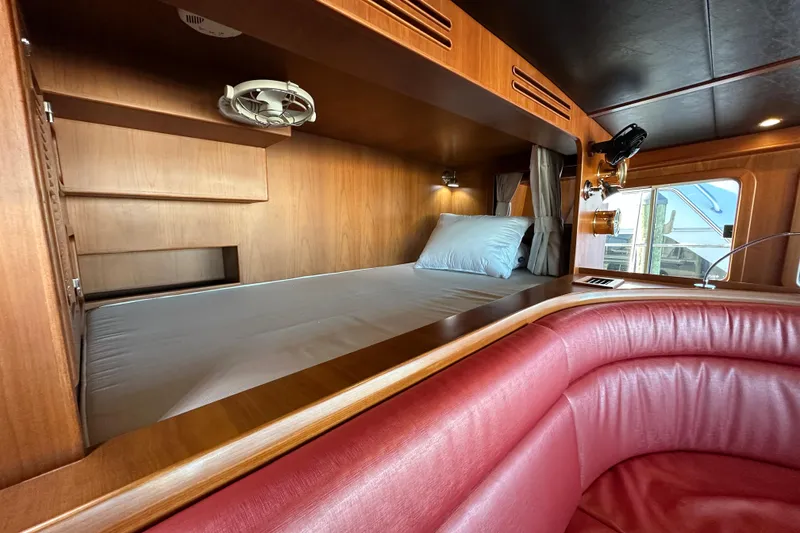 Slide: The Image of Luxurious cabin interior of 2017 Kadey-Krogen 58EB yacht with cozy bed and seating. - 27