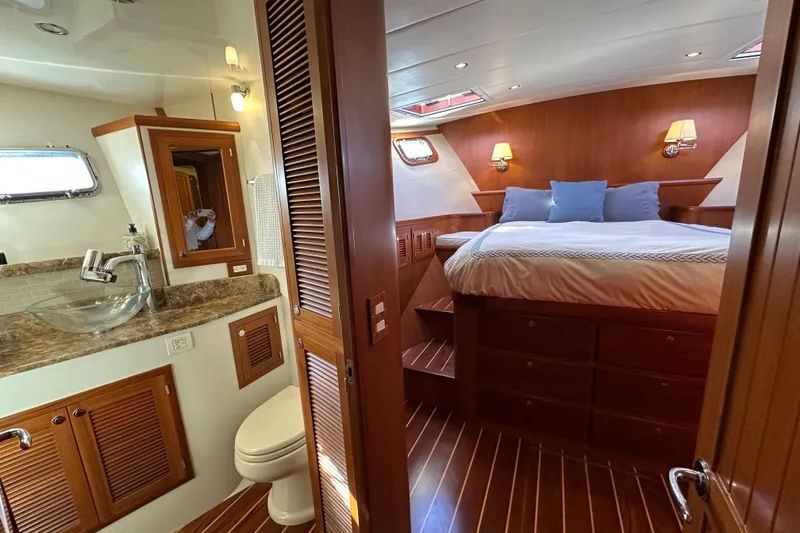 Slide: The Image of Luxurious 2017 Kadey-Krogen 58EB yacht interior with elegant bedroom and bathroom. - 34