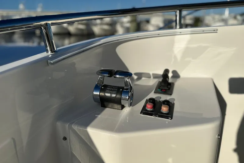 Slide: The Image of Control panel of 2017 Kadey-Krogen 58EB yacht with throttle and switches. - 58