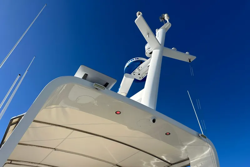 Slide: The Image of Kadey-Krogen 58EB 2017 yacht radar and antenna against clear blue sky. - 65