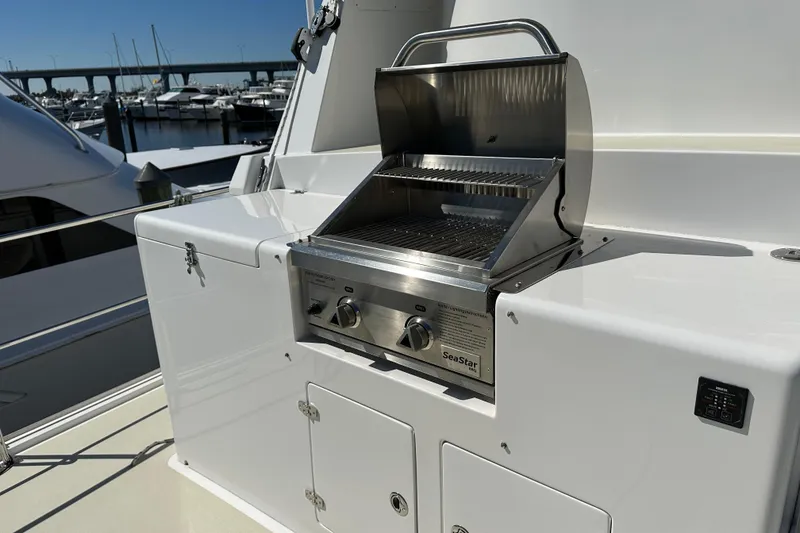 Slide: The Image of Outdoor grill on 2017 Kadey-Krogen 58EB yacht, docked at marina. - 74