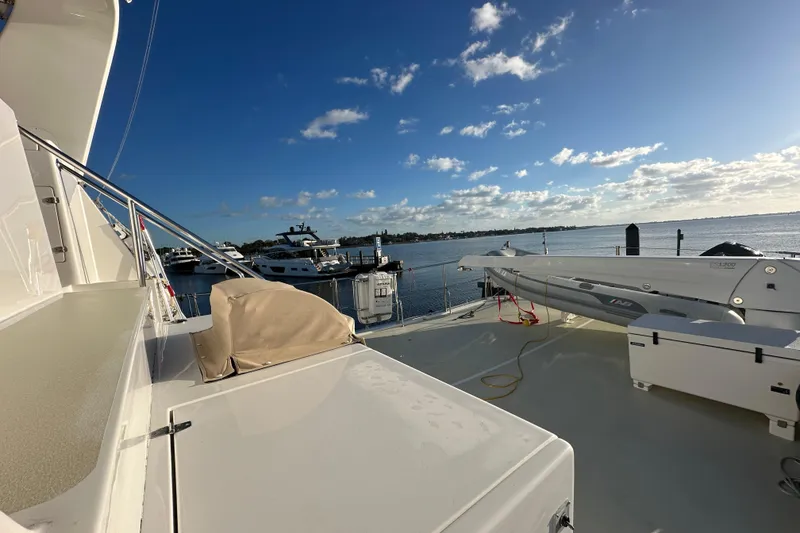 Slide: The Image of 2017 Kadey-Krogen 58EB yacht deck with ocean view and clear blue sky. - 75