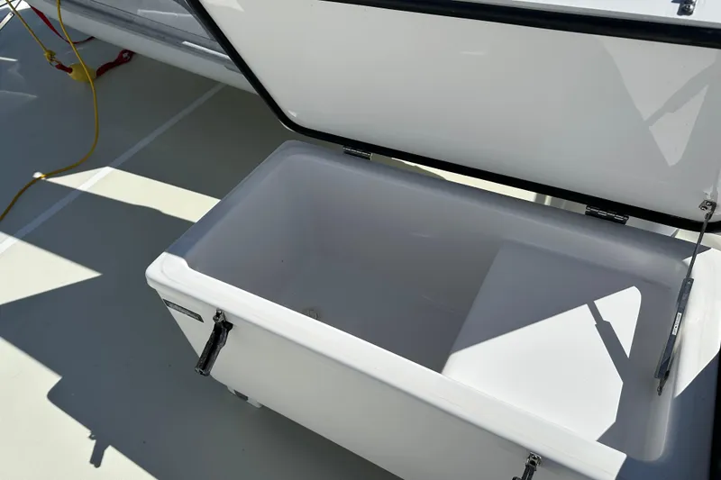Slide: The Image of Open storage compartment on 2017 Kadey-Krogen 58EB boat deck. - 77