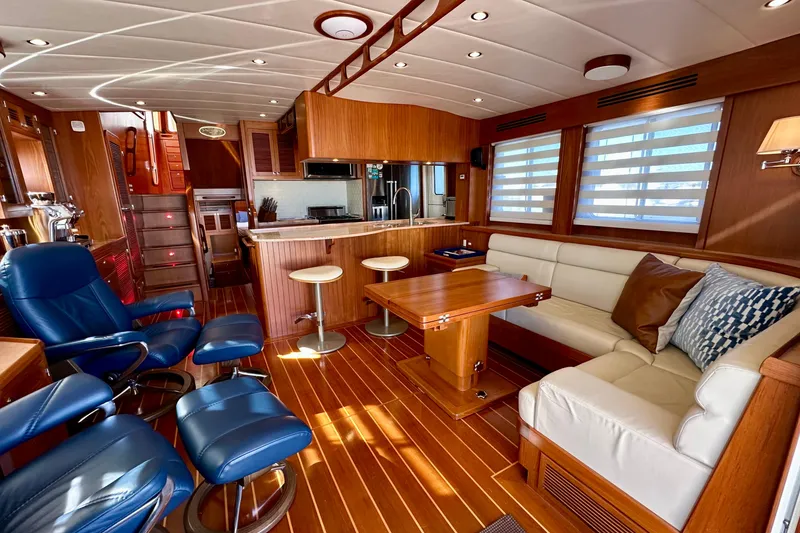 Slide: The Image of Luxurious 2017 Kadey-Krogen 58EB yacht interior with elegant wood finishes and modern furnishings. - 8