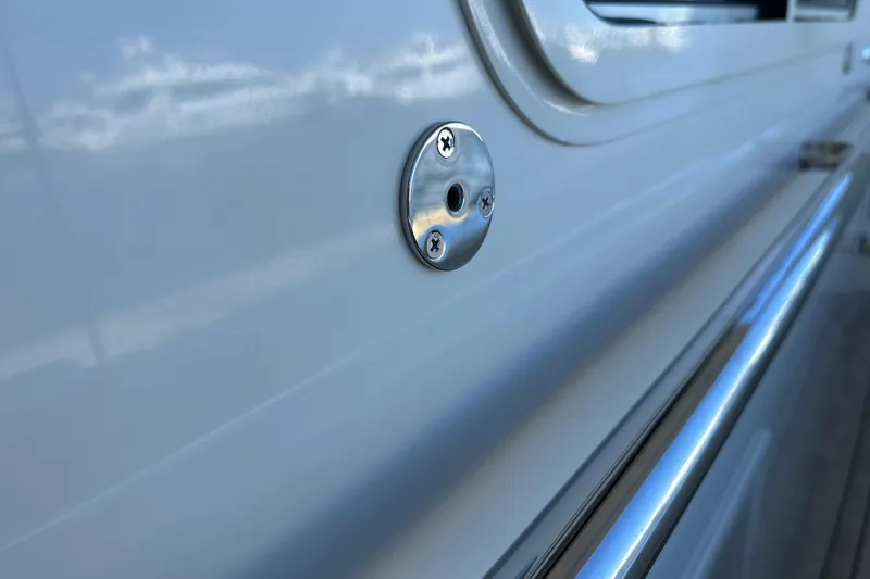 Slide: The Image of Close-up of 2017 Kadey-Krogen 58EB yacht exterior with metal fixture and railing. - 84