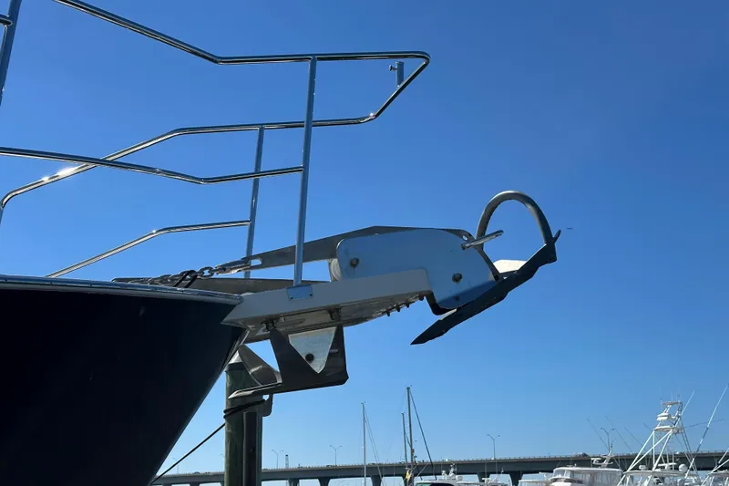 Slide: The Image of Bow of 2017 Kadey-Krogen 58EB yacht with anchor, clear blue sky background. - 88