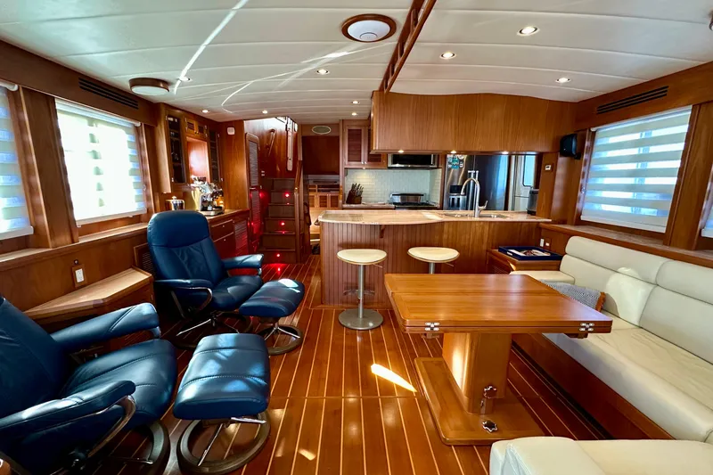 Slide: The Image of Luxurious interior of 2017 Kadey-Krogen 58EB yacht with elegant wood finishes. - 6