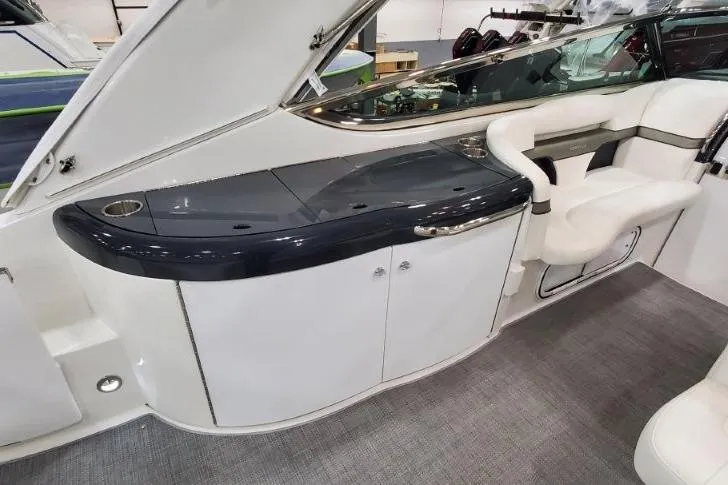 Slide: The Image of 2016 Formula 370 Super Sport boat interior with sleek seating and modern design. - 12