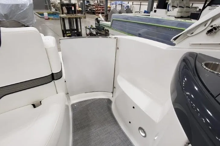 Slide: The Image of Interior view of a 2016 Formula 370 Super Sport boat, featuring seating and sleek design. - 18