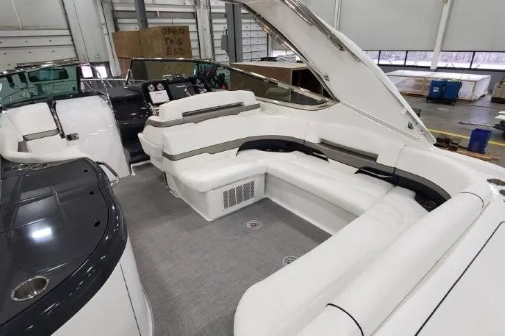 Slide: The Image of 2016 Formula 370 Super Sport boat interior with white seating and modern design. - 22