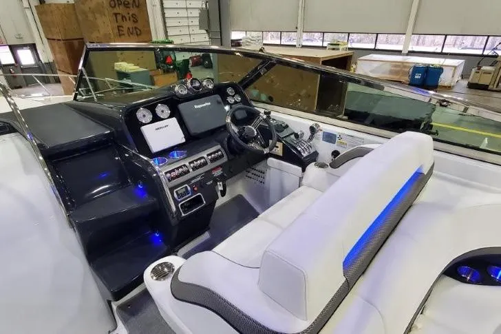 Slide: The Image of 2016 Formula 370 Super Sport boat interior with modern dashboard and seating. - 24