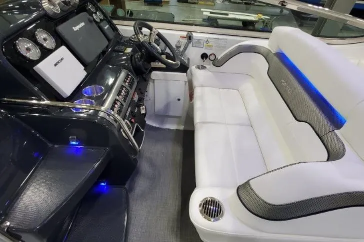 Slide: The Image of 2016 Formula 370 Super Sport boat interior with modern dashboard and white seating. - 26