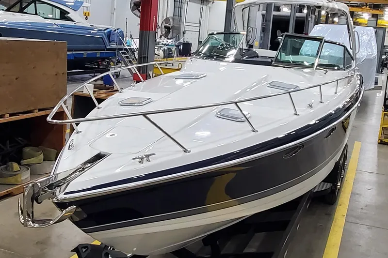 Slide: The Image of 2016 Formula 370 Super Sport boat in a workshop setting. - 3