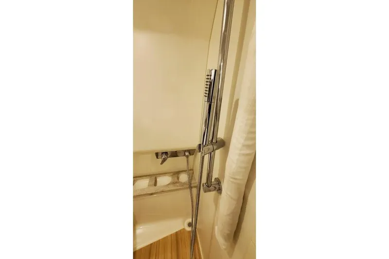 Slide: The Image of Shower area in 2016 Formula 370 Super Sport boat with chrome fixtures. - 34