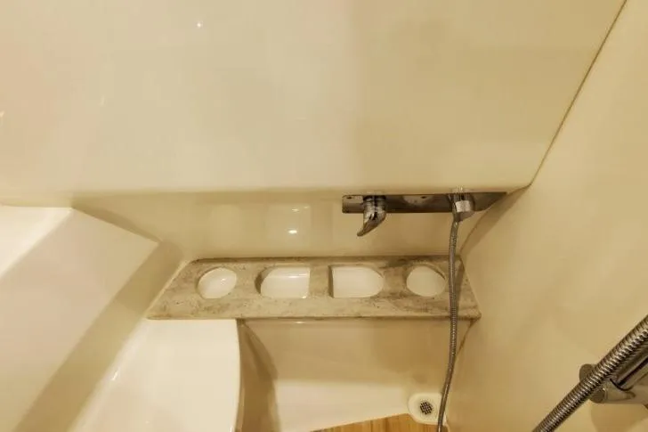 Slide: The Image of 2016 Formula 370 Super Sport bathroom with modern fixtures and sleek design. - 35