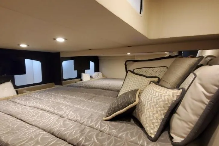 Slide: The Image of Interior cabin of 2016 Formula 370 Super Sport with cozy bedding and pillows. - 38