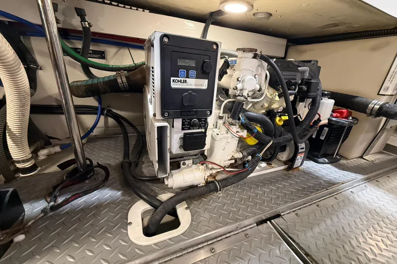 Slide: The Image of Engine room of a 2016 Formula 370 Super Sport with Kohler generator. - 71