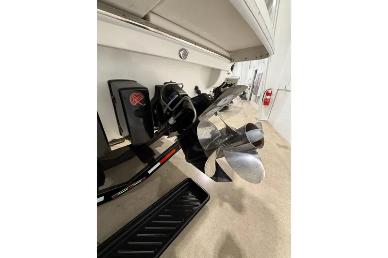 Slide: The Image of 2016 Formula 370 Super Sport boat propeller and stern detail in a showroom. - 77