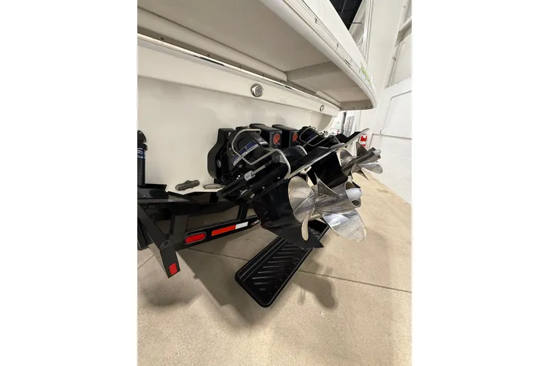 Slide: The Image of 2016 Formula 370 Super Sport boat propellers in a showroom setting. - 78