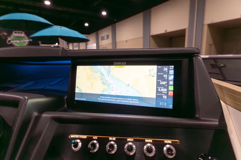 Slide: The Image of Dashboard of Alera M23Q 2026 with navigation display and control panel. - 10