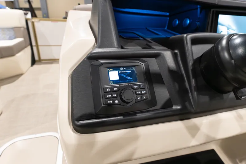 Slide: The Image of Control panel of 2026 Alera M23Q boat with digital display and buttons. - 11