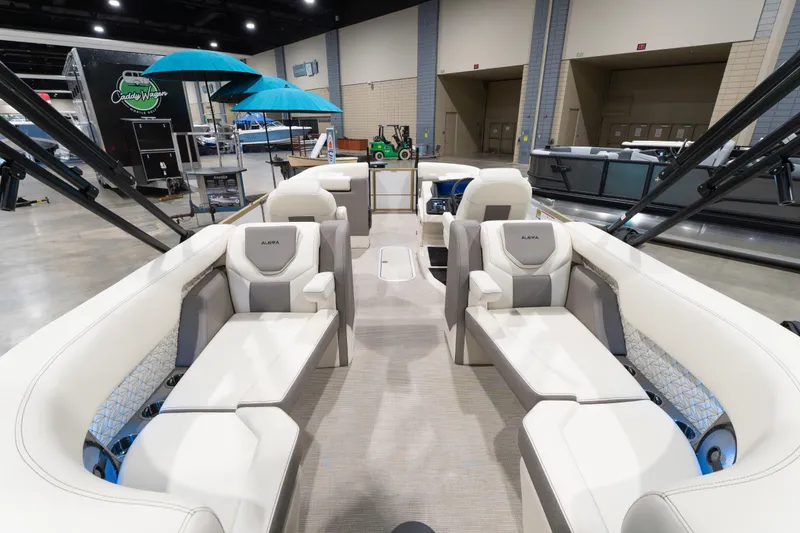 Slide: The Image of Interior view of 2026 Alera M23Q boat with luxurious seating and modern design. - 14
