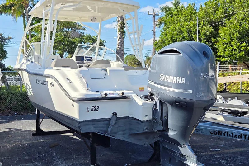 Slide: The Image of 2020 Key West 239 DFS boat with Yamaha engine on a trailer. - 2