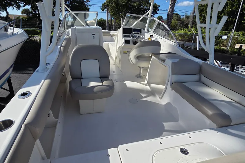 Slide: The Image of 2020 Key West 239 DFS boat interior with seating and steering console. - 5