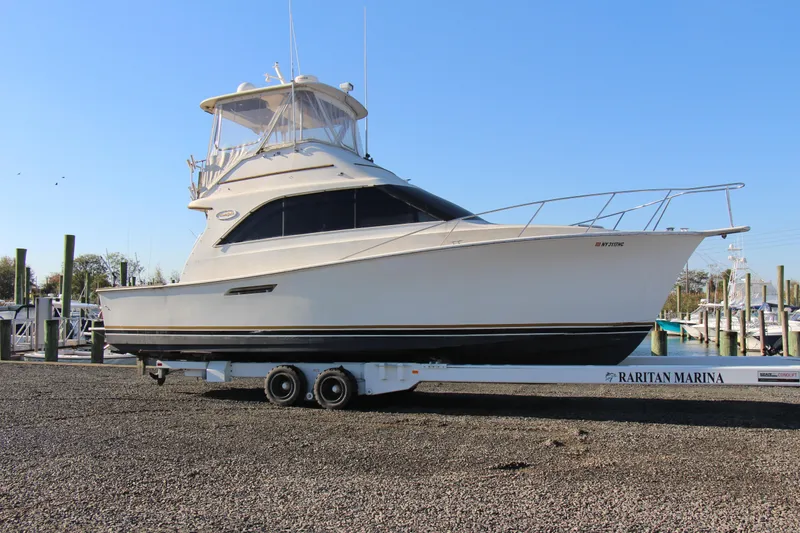 The Image of 1989 Ocean Yachts 35 Super Sport on trailer at Raritan Marina. - 0