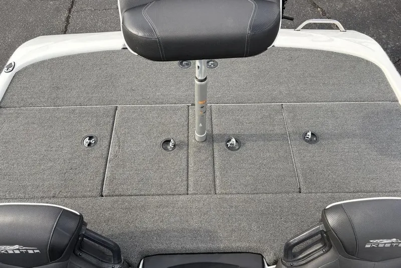 Slide: The Image of 2023 Skeeter ZXR21 boat deck with seating and storage compartments. - 27