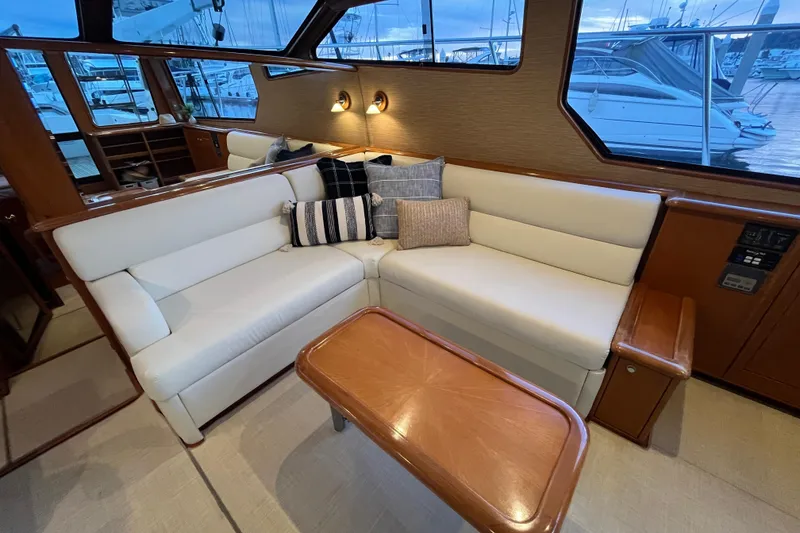 Slide: The Image of Luxurious interior of 2001 Mikelson Luxury Sportfisher with plush seating and elegant decor. - 12
