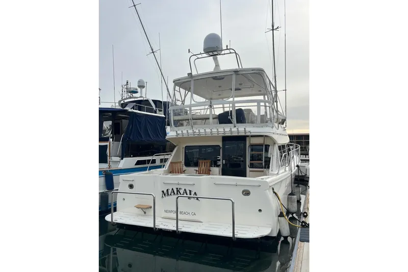 Slide: The Image of 2001 Mikelson Luxury Sportfisher yacht docked at Newport Beach marina. - 2