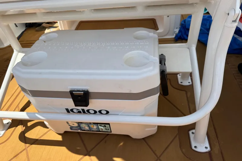 Slide: The Image of Igloo cooler on 2021 Robalo R242 Center Console boat deck. - 13