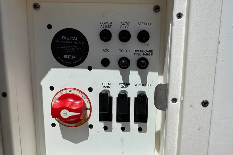 Slide: The Image of Control panel of 2021 Robalo R242 Center Console boat with switches and digital relay. - 21