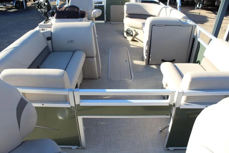 Slide: The Image of 2022 Avalon Venture Fish N Cruise 22 FT pontoon boat interior with beige seating. - 10