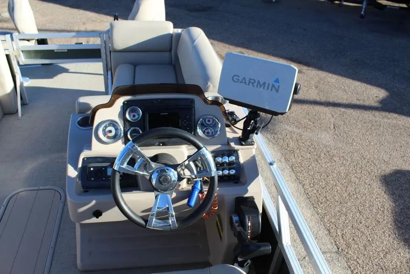 Slide: The Image of 2022 Avalon Venture Fish N Cruise 22 FT boat dashboard with Garmin navigation system. - 14