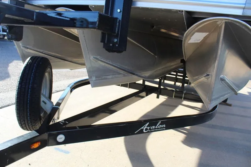 Slide: The Image of 2022 Avalon Venture Fish N Cruise 22 FT pontoon boat on trailer. - 6