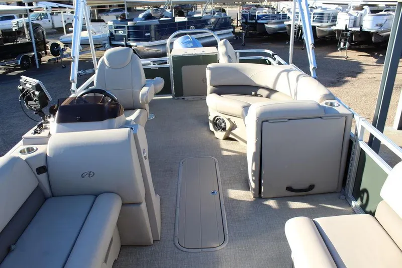 Slide: The Image of 2022 Avalon Venture Fish N Cruise 22 FT pontoon boat interior with beige seating. - 8