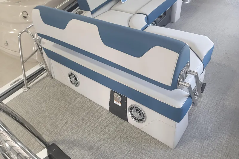 Slide: The Image of 2026 Avalon Platinum Catalina 2585 boat interior with blue and white rear bench seating. - 3