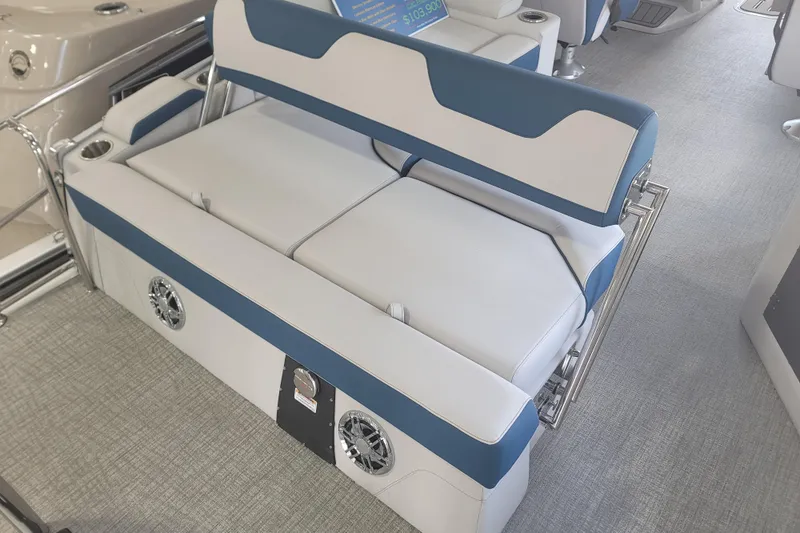 Slide: The Image of 2026 Avalon Platinum Catalina 2585 boat interior with blue and white seating. - 4