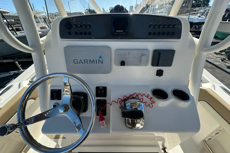 Slide: The Image of Center console of 2020 Pioneer 222 Sportfish with Garmin and Suzuki electronics. - 12