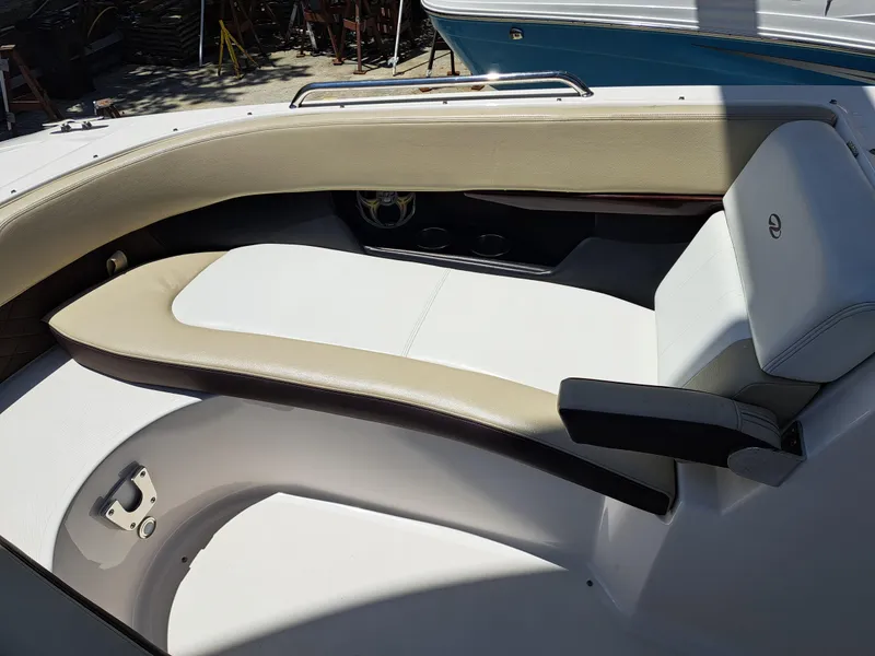 Slide: The Image of 2014 Regal 2700 Bowrider boat interior seating area. - 18
